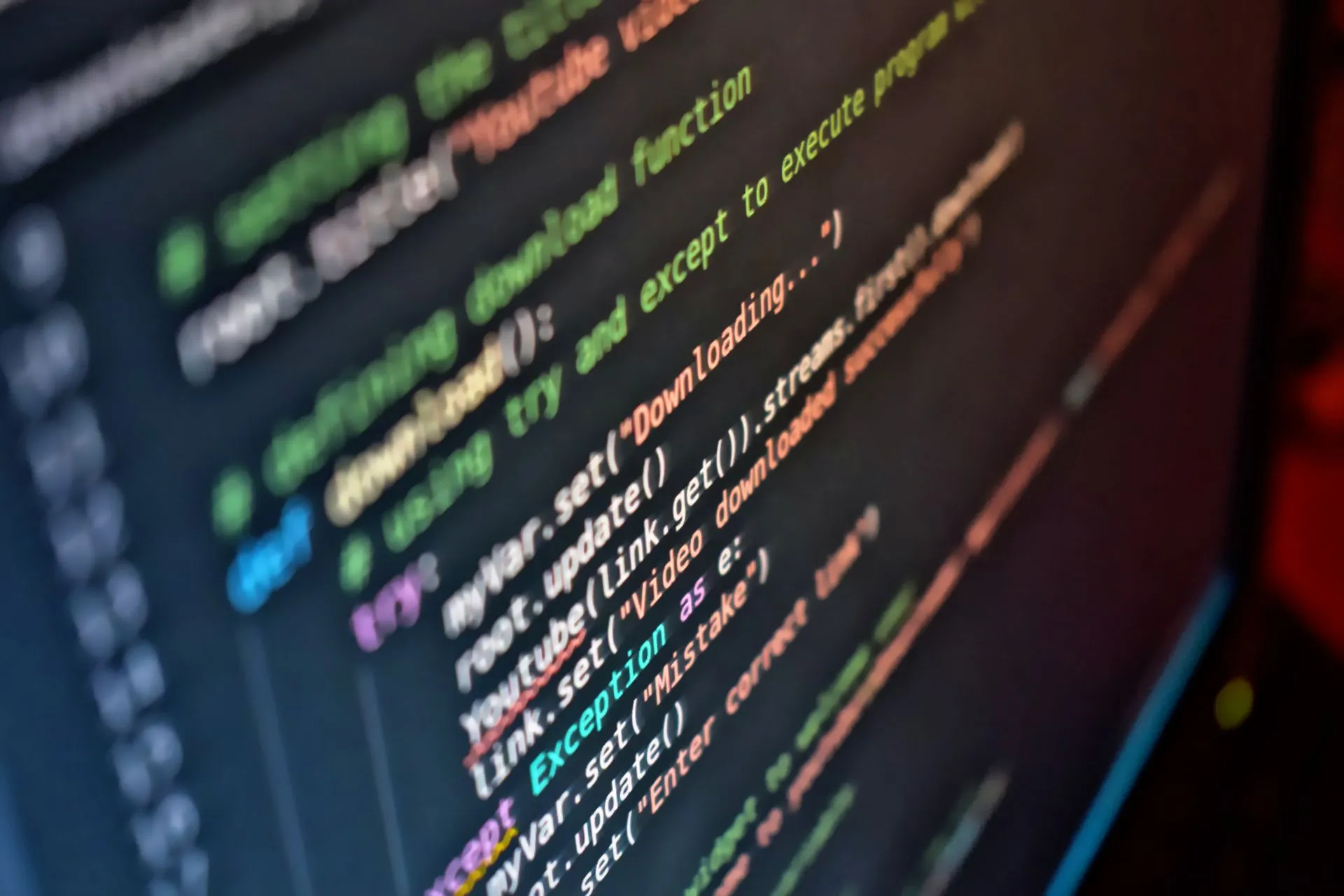 Vivid close-up of code on a computer screen showcasing programming details, illustrating Momentic launches Mo for AI software testing as Blitzy maps codebases for coding agents