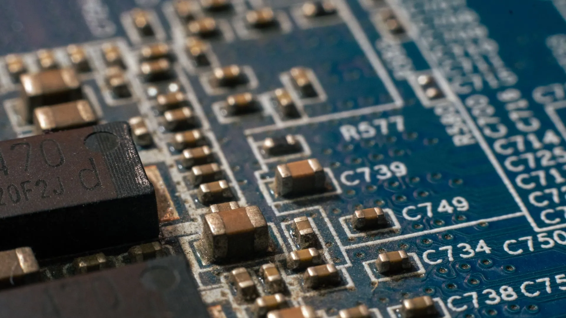 Detailed macro shot of a circuit board highlighting electronic components and traces, illustrating AWS opens Bedrock Managed Agents powered by OpenAI in preview, keeping agents inside