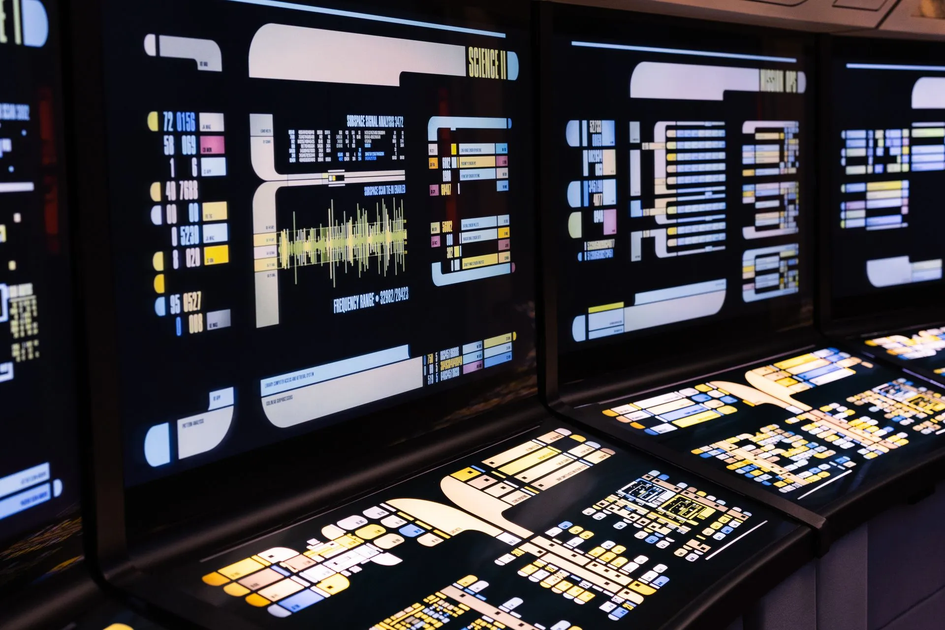 High-tech command center with advanced digital displays and control panels, illustrating Board security briefing
