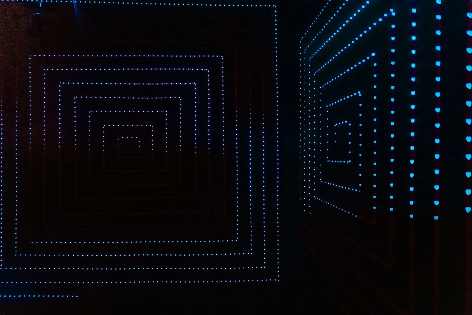 Abstract LED light pattern creating a geometrical illusion in a dark room setting, illustrating Eclipse Foundation launches Sovereign AI Foundation with 17 founding organizations