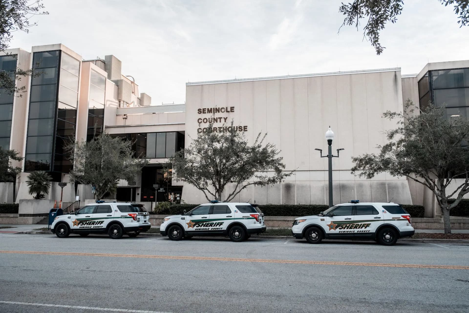 Sheriff vehicles parked in front of Seminole County Courthouse during the day, illustrating Florida seeks OpenAI injunction to block new models without third-party safety approval