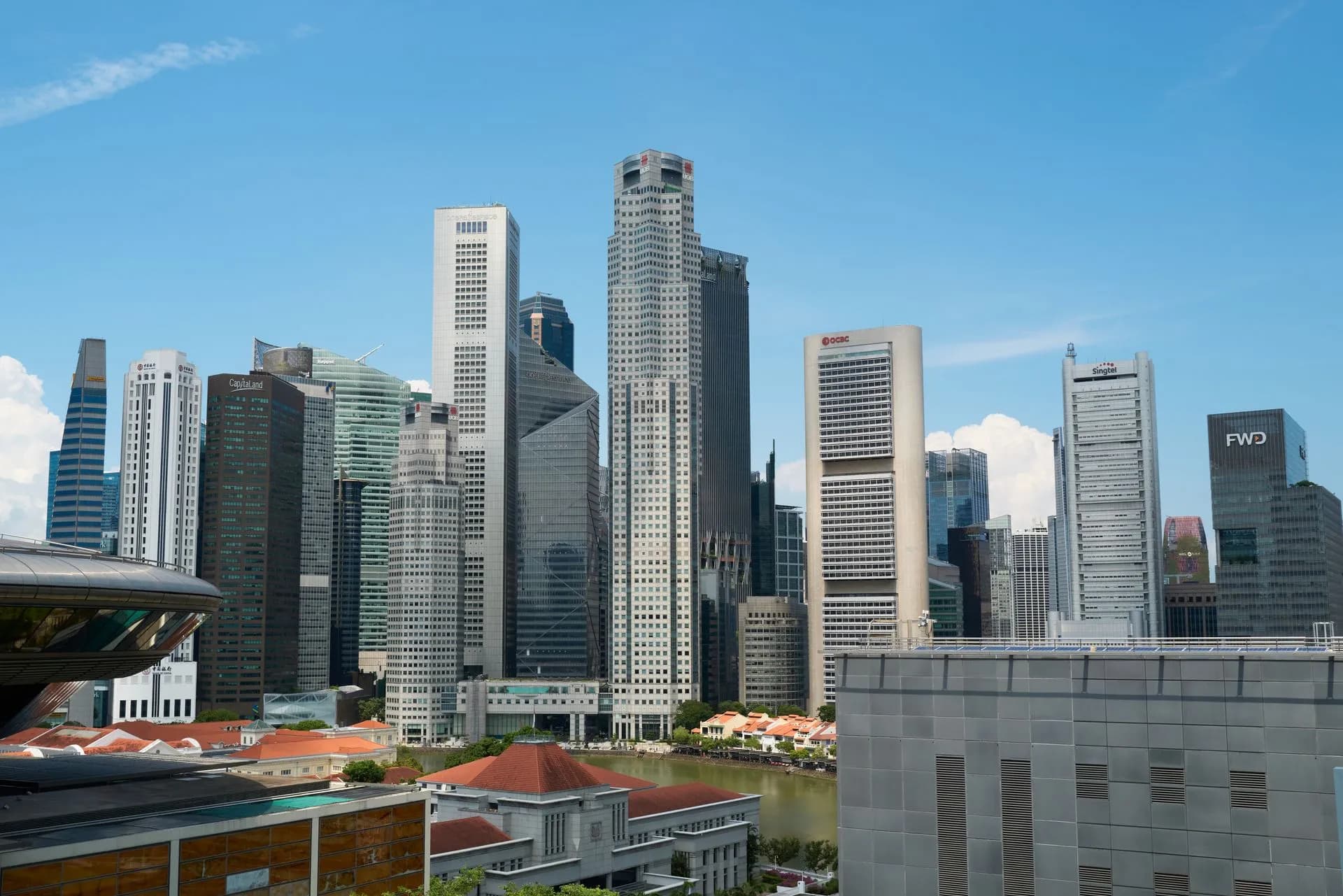 View of Singapore skyline showcasing modern skyscrapers on a clear day, illustrating Manus raises over $500 million at a reported $4 billion valuation after Meta deal collapse