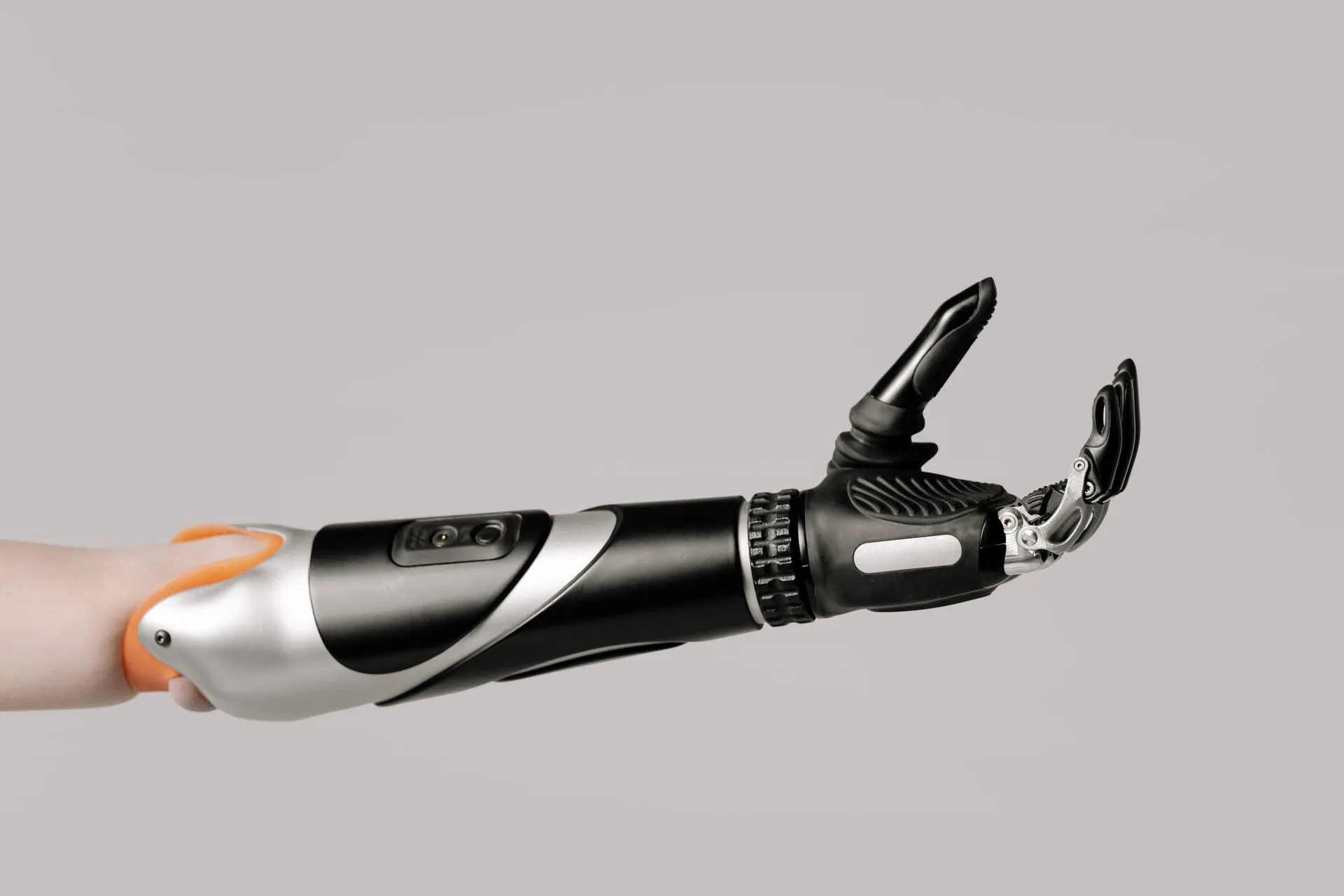 Close-up of a modern prosthetic arm displaying advanced technology and design, illustrating Mecka AI raises $60 million from Sequoia to supply training data for robots