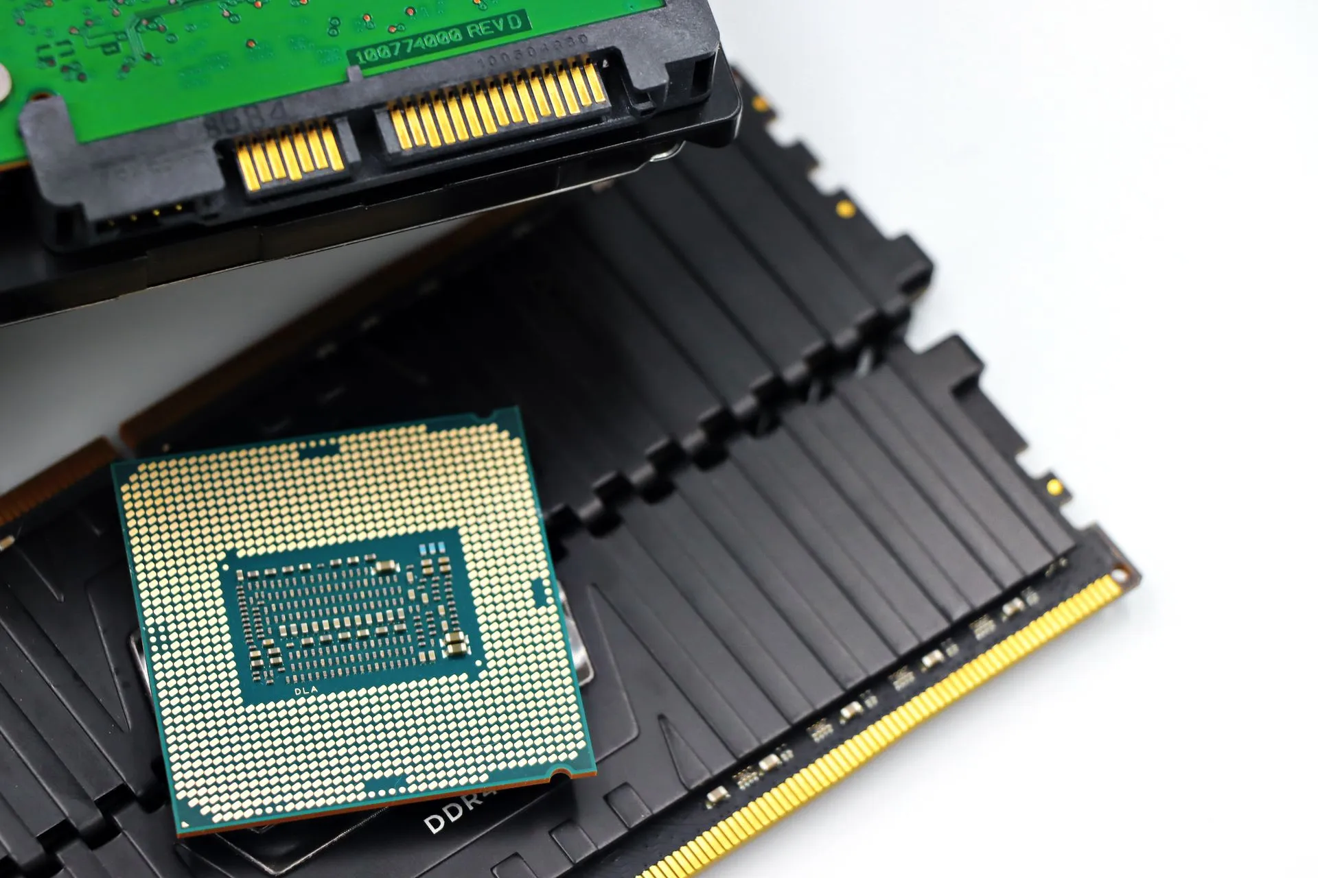 Detailed view of a CPU chip and RAM modules, illustrating computer hardware components, illustrating Nvidia DGX Spark, Raspberry Pi, Galaxy S26 and Shield TV get pricier amid memory