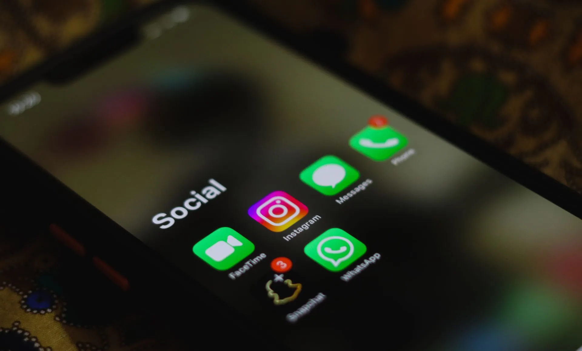 A close-up shot of smartphone displaying social media apps icons on screen, illustrating Meta privacy verdict