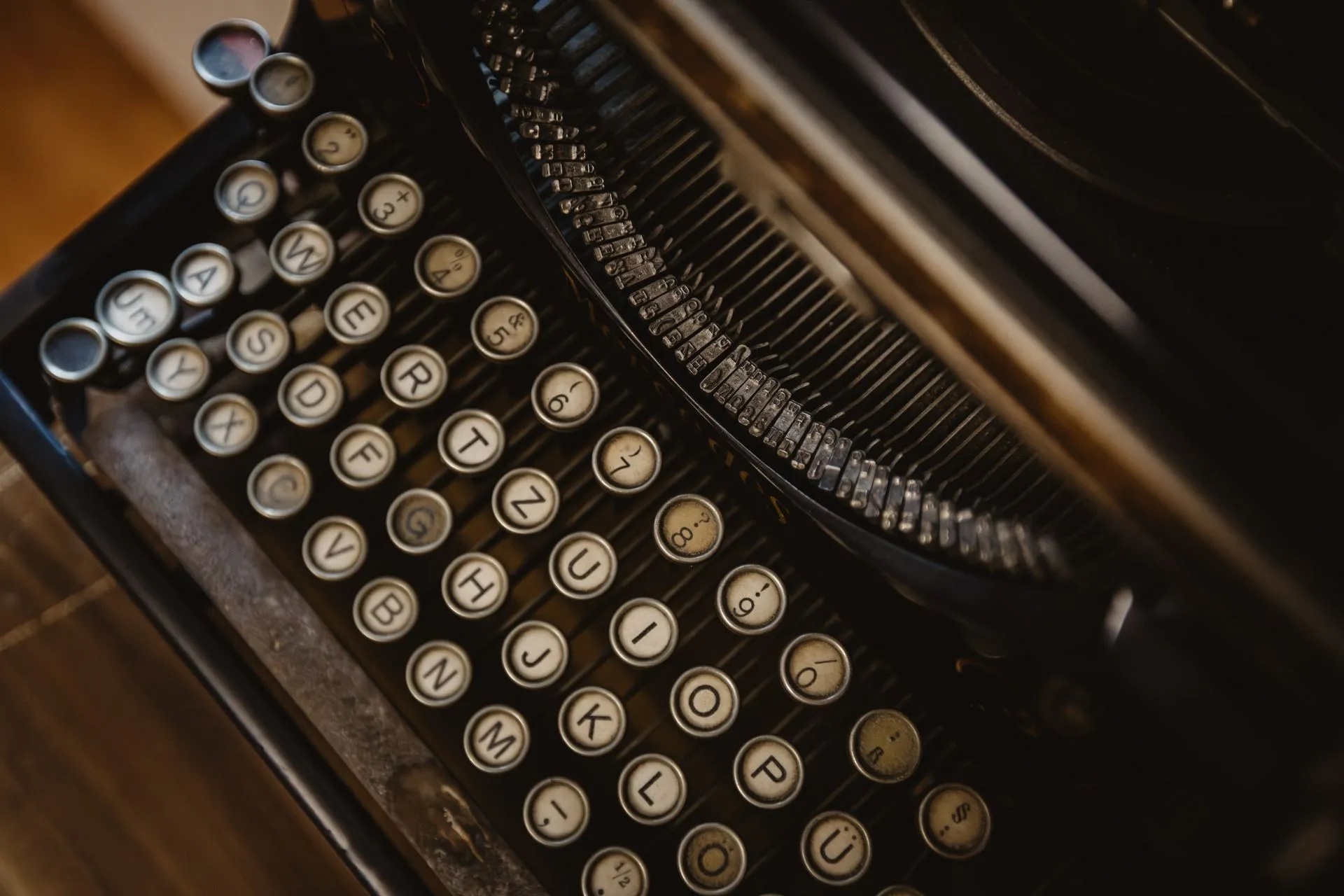 Detailed close-up of vintage typewriter with round keys, showcasing retro design, illustrating OpenAI brings text watermarking to ChatGPT and Codex in the EU to meet AI Act rules