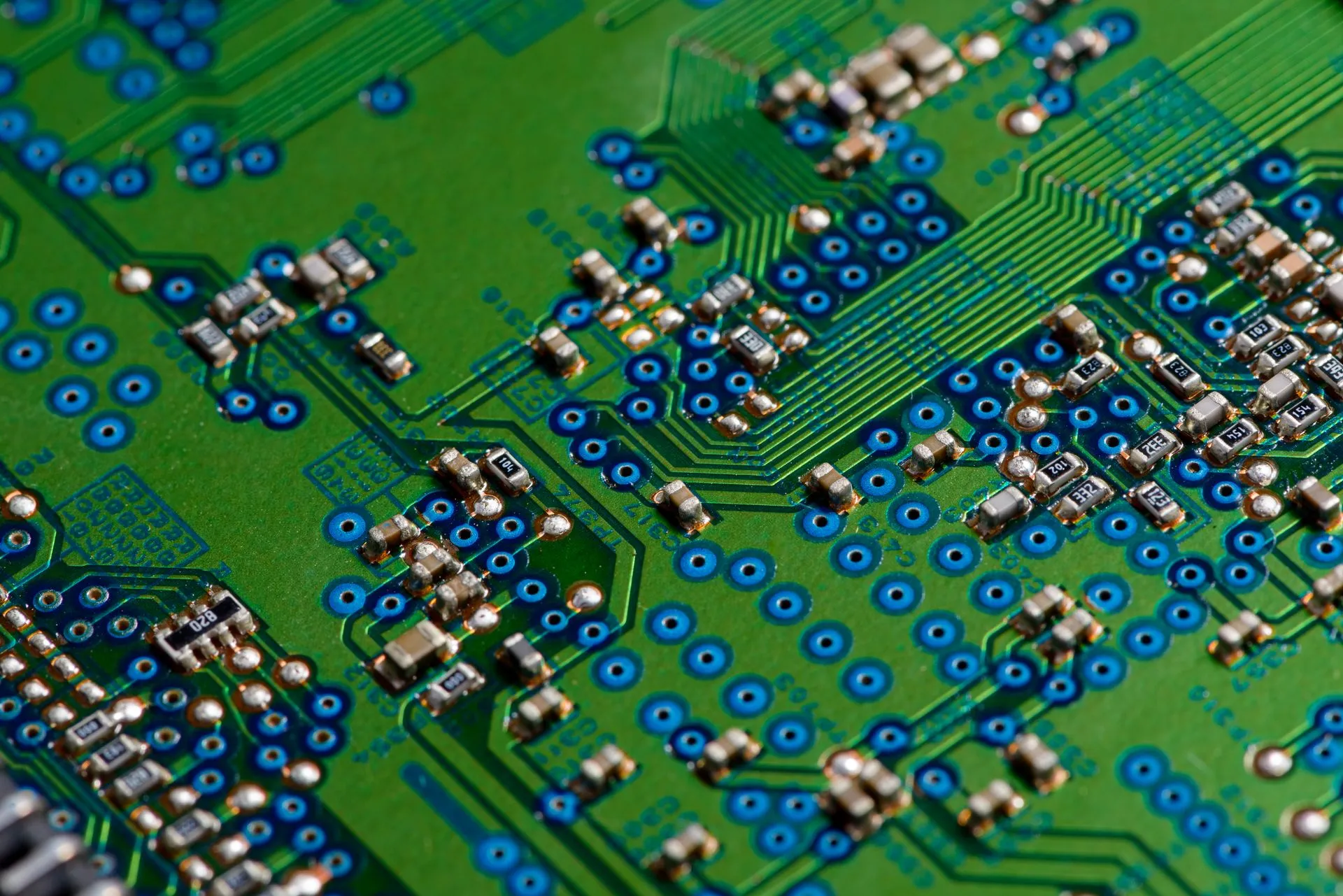 Detailed image of green circuit board showcasing electronic components for technology use, illustrating OpenAI GPT-6 Astra Ultrafast runs up to 8x faster on Nvidia Blackwell, at 6x the