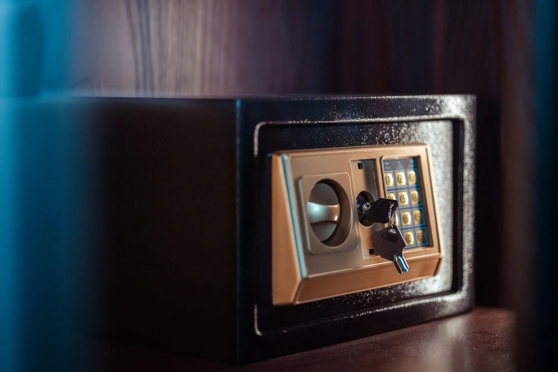 Close-up image of an electronic safe with a key in Baghdad, Iraq, illustrating Stablecoin firm Rain applies to OCC for a New York national trust bank charter