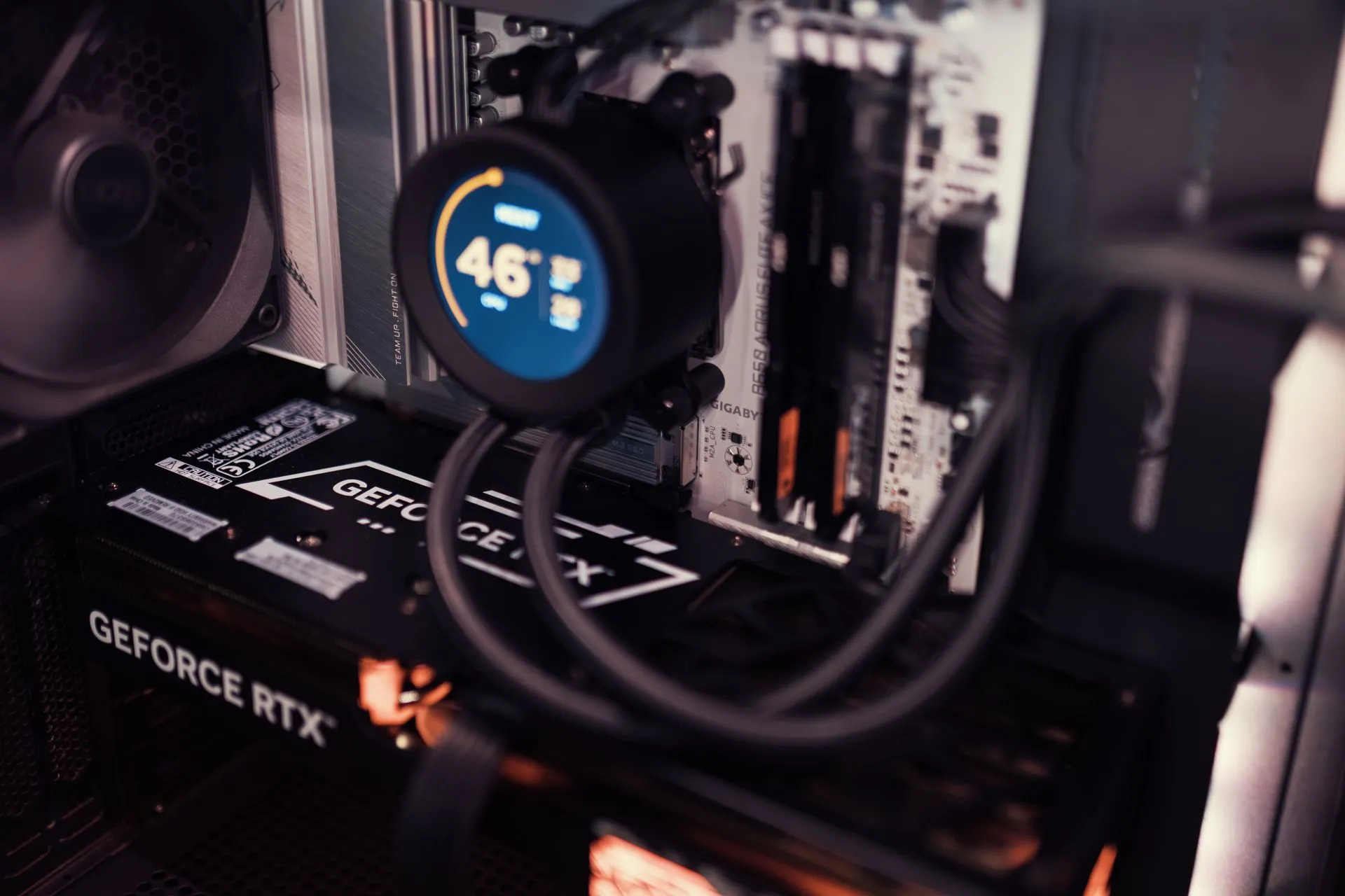 Close-up of a gaming PC interior featuring a GeForce RTX graphics card and cooling system, illustrating Reflection AI Beam debuts as a 501B open-weight model pitched against Chinese