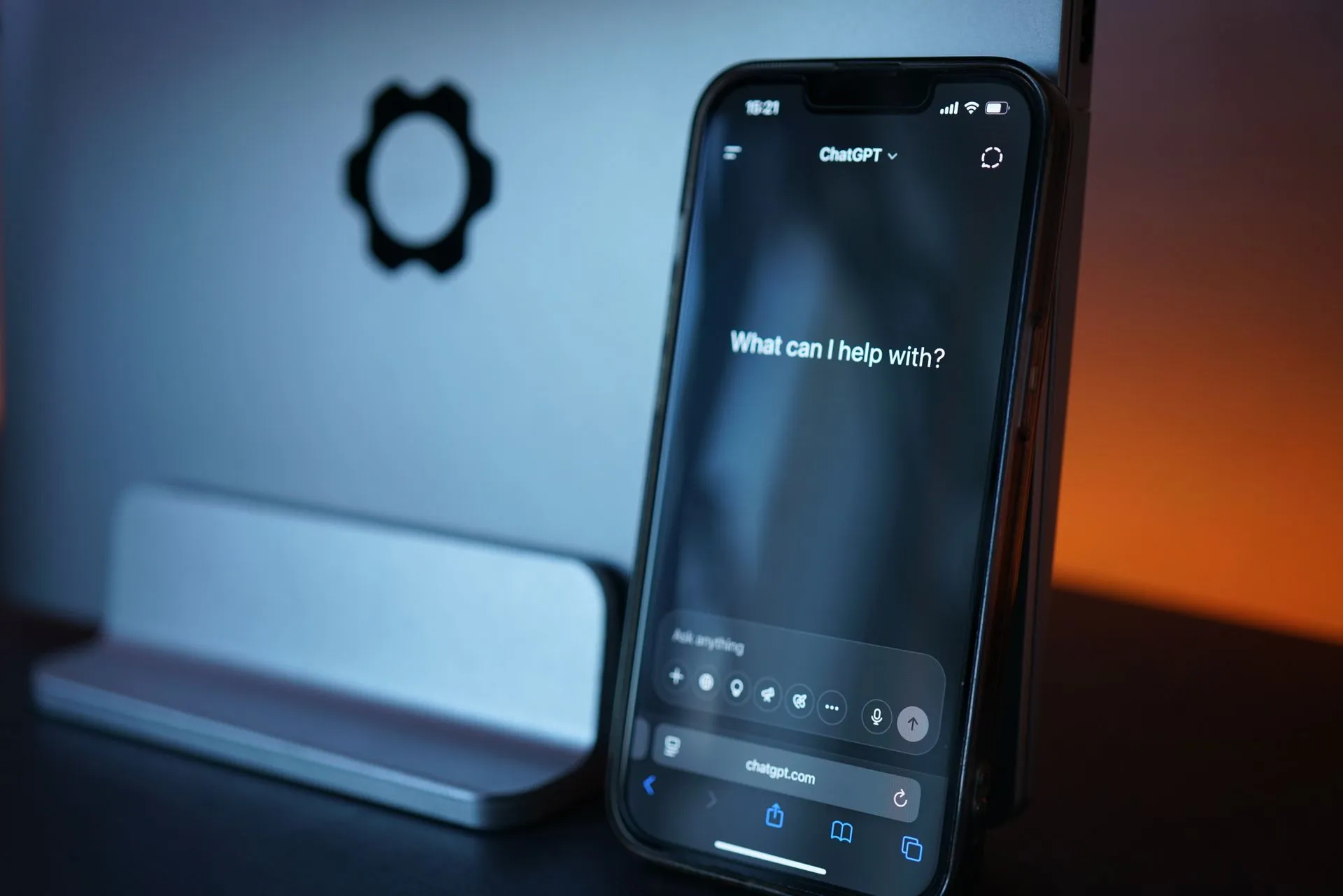 Close-up of a smartphone with AI chat interface, showcasing advanced technology in a sleek design, illustrating Apple begins Siri AI beta on models built in collaboration with Google's